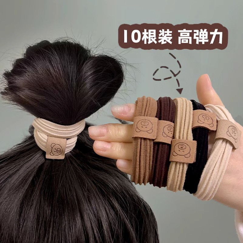 Versión coreana cute bear head cord cordón de cuero de alta elasticidad cordón de pelo para mujeres nuevo estilo hoyo croqueta duradera tocados fundas de cuero