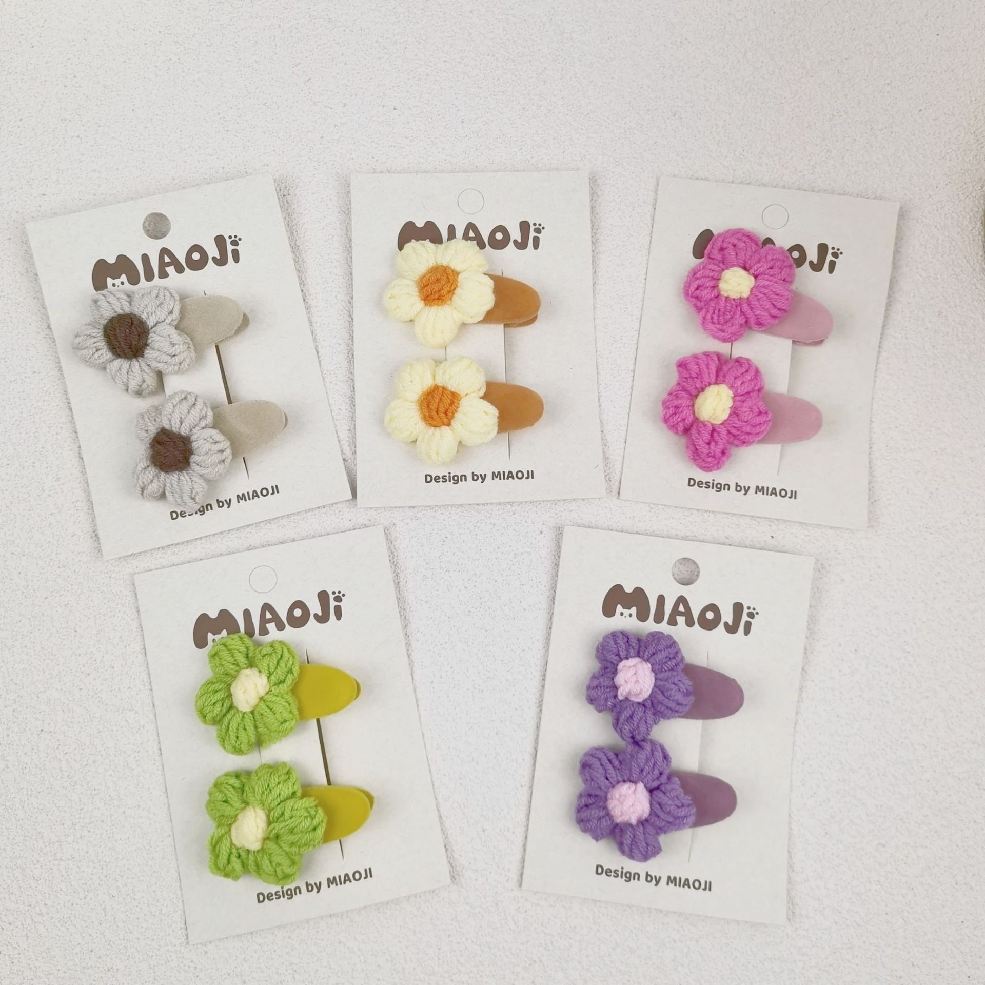 A Korean version of a little girl's side-cut hair clip with princess sunflower braided and children's wool flower clips details Picture