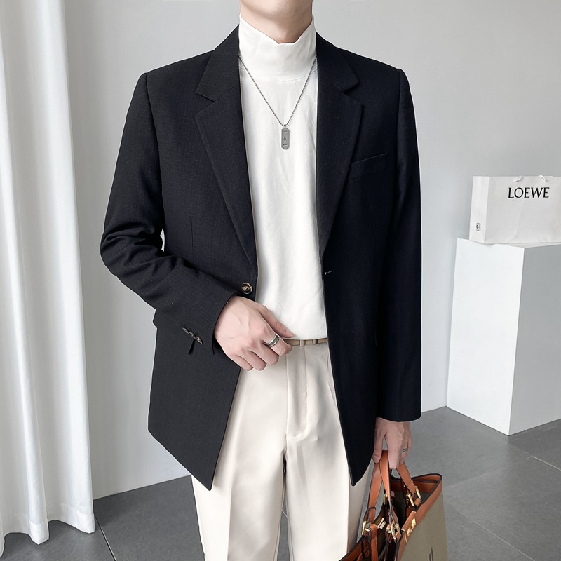 The new autumn men's suit made of British linen fabric is loose and drape, with a light and mature Korean style. Suit trend details Picture