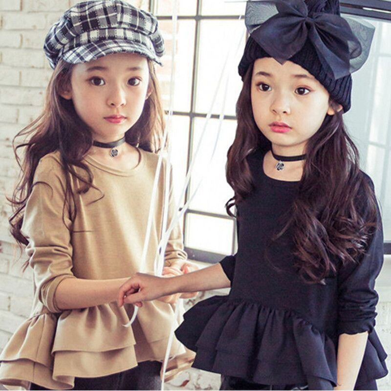 Polainas de primavera y otoño para niñas volantes manga larga ropa de niños versión coreana de algodón versátil falda plisada gran niño camiseta