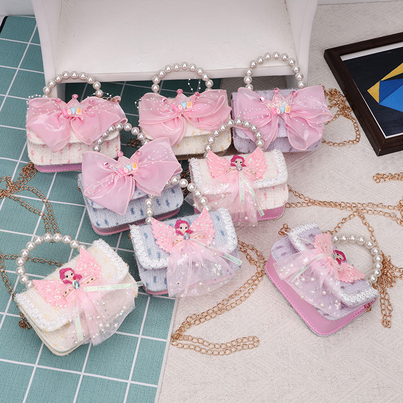女童包包女孩珍珠美人鱼公主手提包迷你零钱包蝴蝶结洋气斜挎包