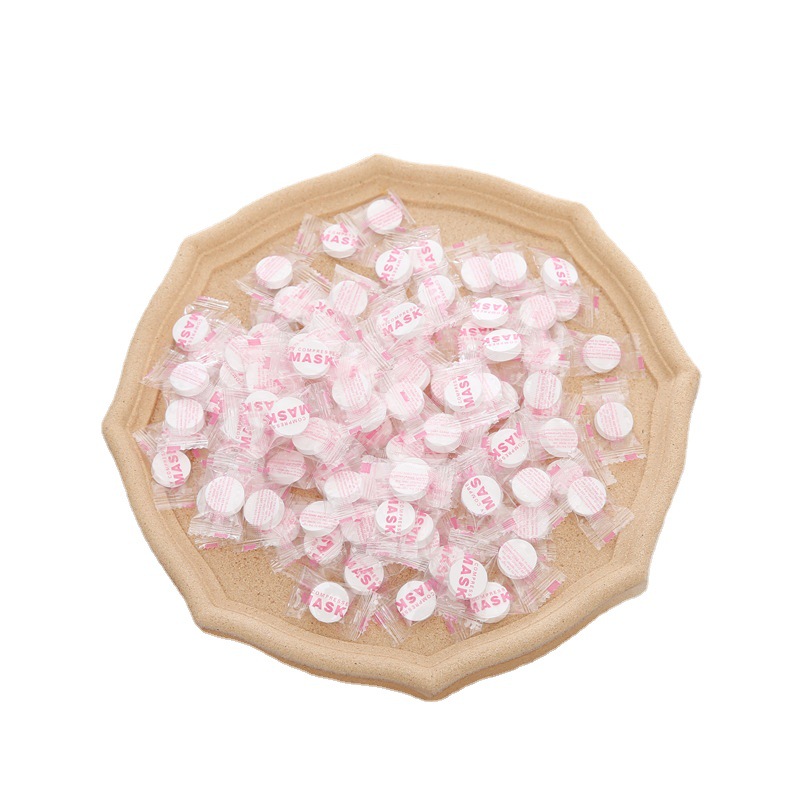 Stock disposable compressed mask particles outdoor travel portable mask paper factory directly for 50 bags Item Picture