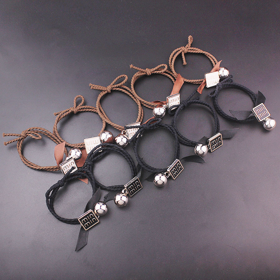 Wholesale of European and American woven, knotted, ribbon, bow hair ties, milk tea, coffee-colored rubber bands, simple ponytail hair ties