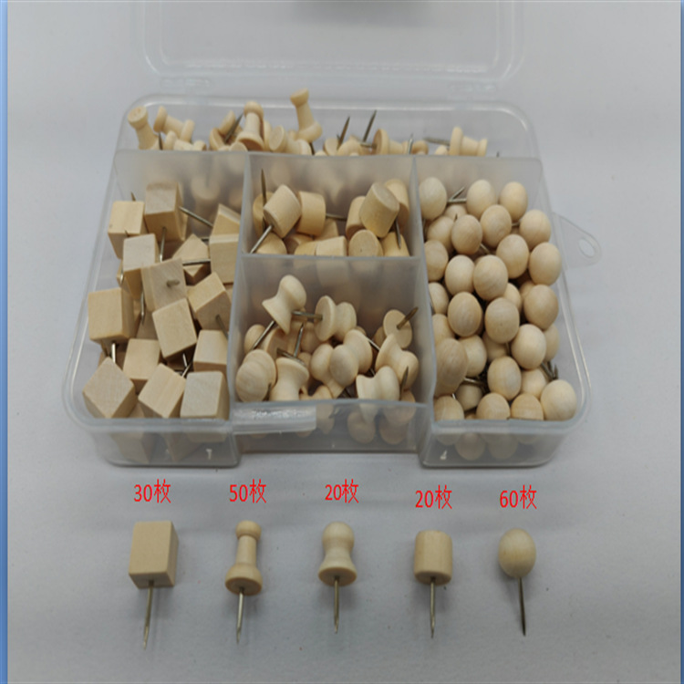 A creative office message board composed of 180 wooden thumbtacks, kindergarten art nails, I-shaped nails, and a cork photo wall