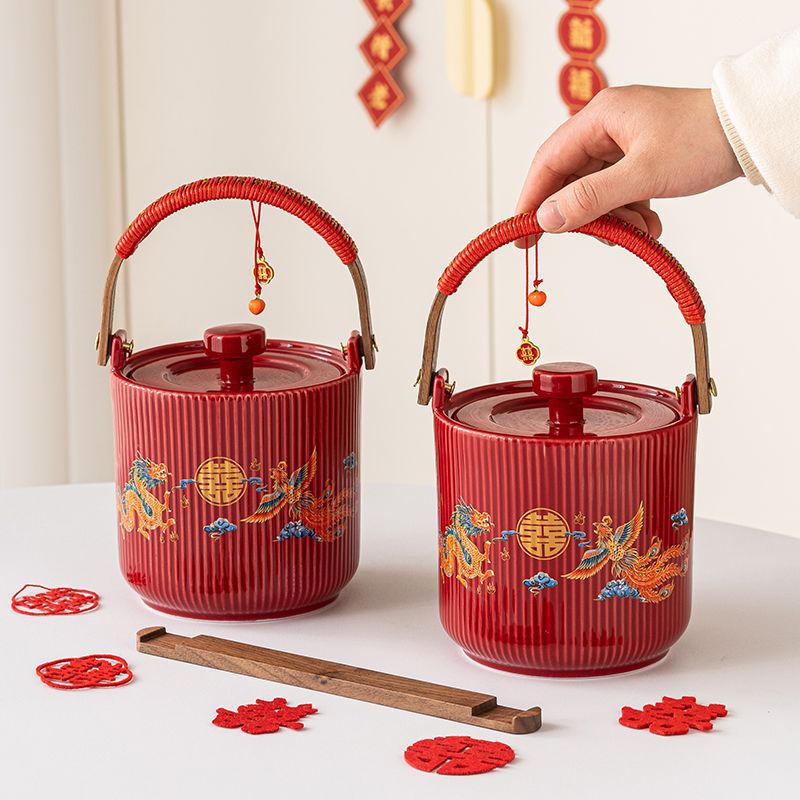 A pair of large ceramic red wedding buckets with auspicious dragon and phoenix descendants, as bride's dowry and decorative items for the wedding room Specification image