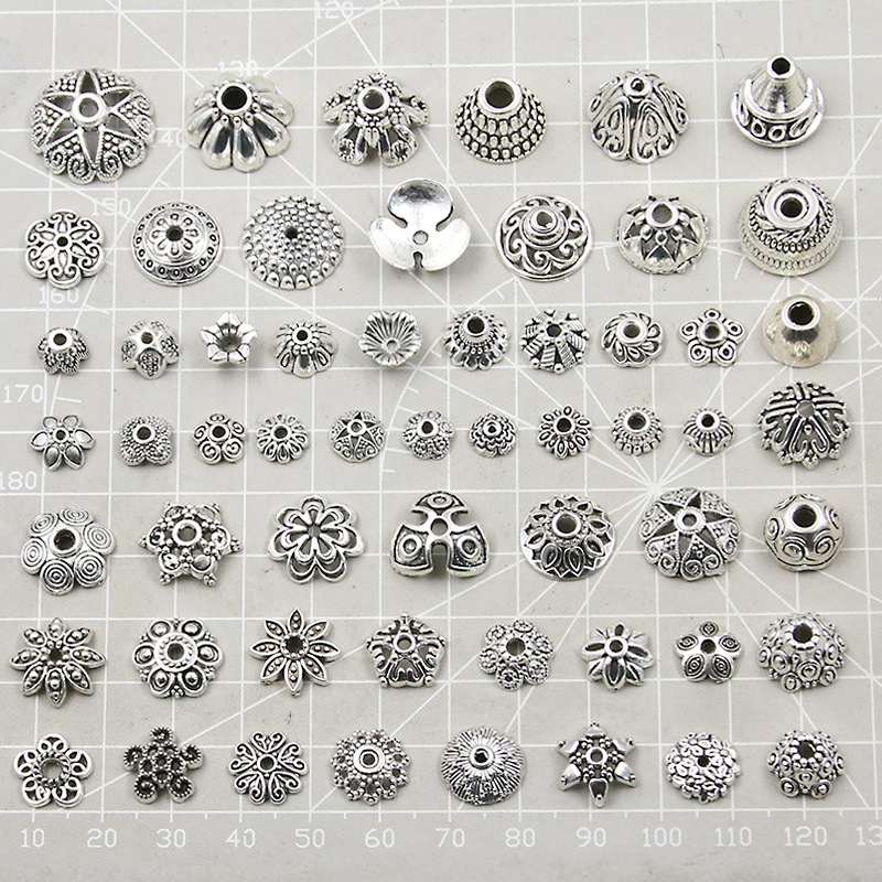 A variety of popular handcrafted diy necklaces, bracelets and small accessories made of ancient silver alloy flower stands with hollowed-out flowers details Picture