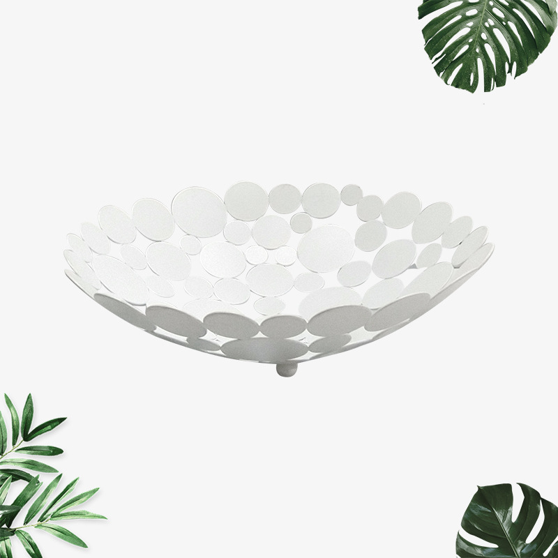 Golden round pieces of wrought iron fruit plate