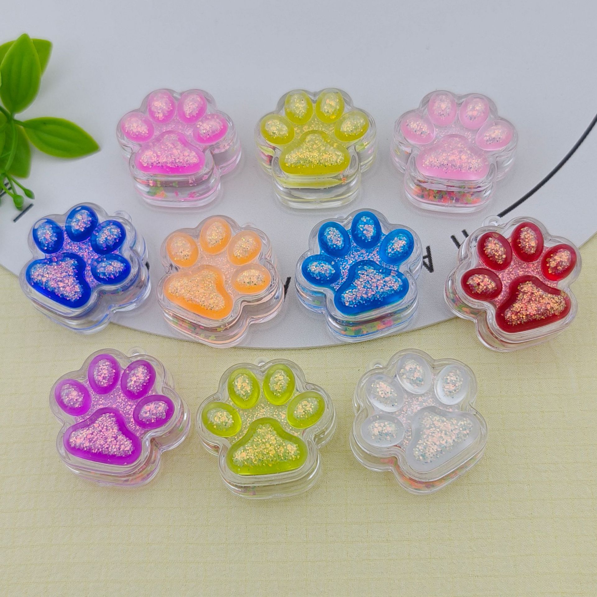 10-color double-sided luminous flowing sand cat paw pendants, keychains, bags, schoolbags, accessories and ornaments, best-selling gifts for festivals details Picture