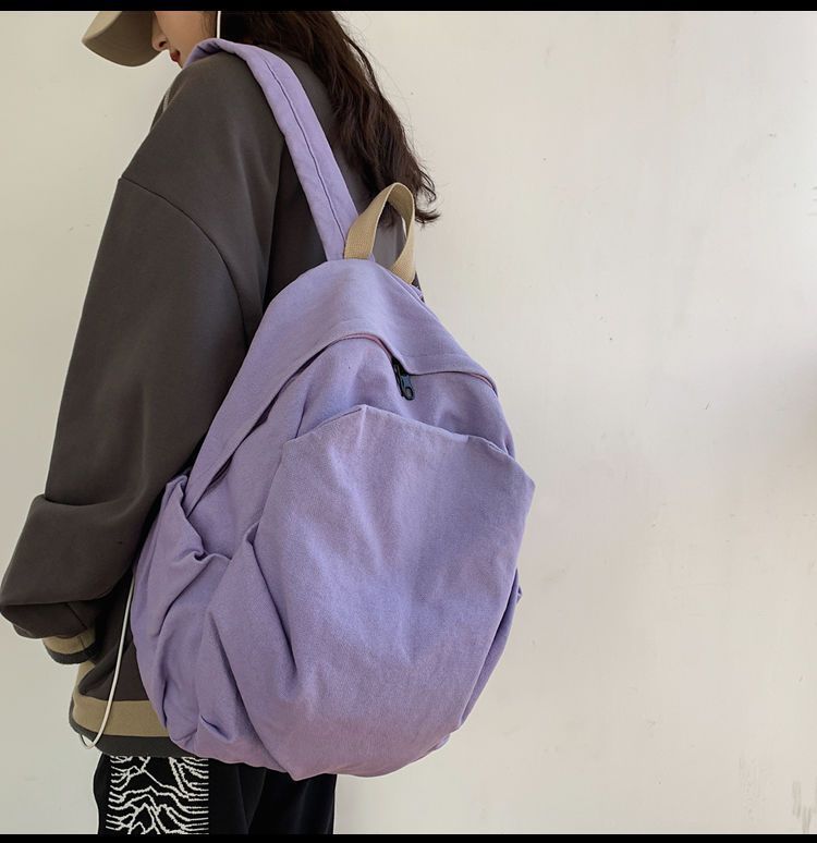 小众帆布书包女新款大容量大学生简约初中复古背包双肩包旅行原宿详情10
