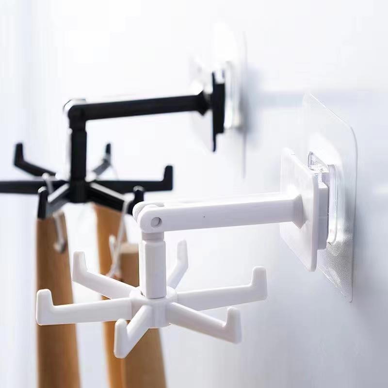 The kitchen multi-functional storage 360-degree rotating wall-mounted adhesive hook is a powerful and creative rotating hook for hanging on the wall