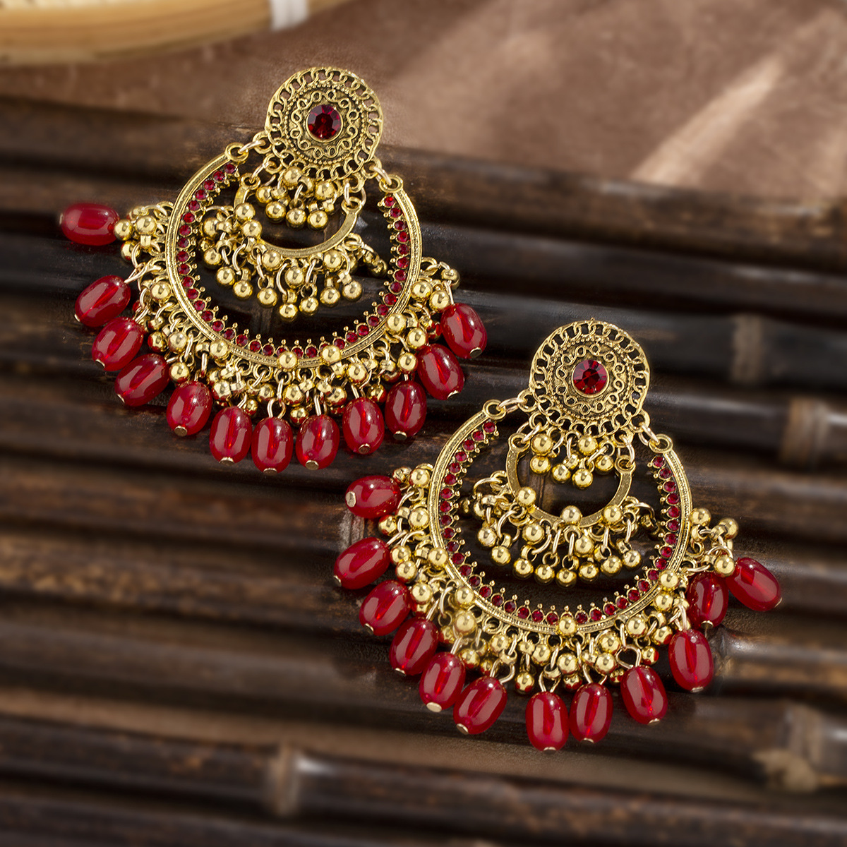 European and American oversized retro earrings, Bohemian exotic style hollowed-out earrings, ethnic style bell tassel earrings for women