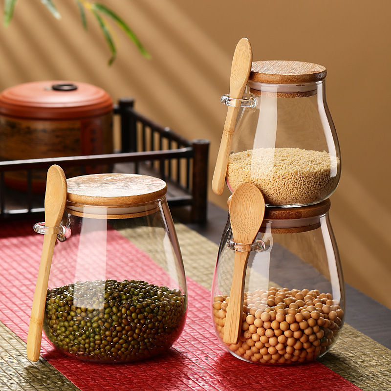 Wholesale high borosilicate glass wooden spoon storage jars, round glass seasoning jars, transparent candy and food storage sealed jars details Picture