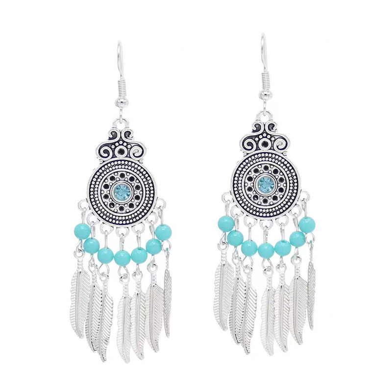 Hot-selling exotic style earrings, retro, artistic, classical and elegant ear hooks, versatile, hollowed-out fashionable tassel pendant earrings Item Picture