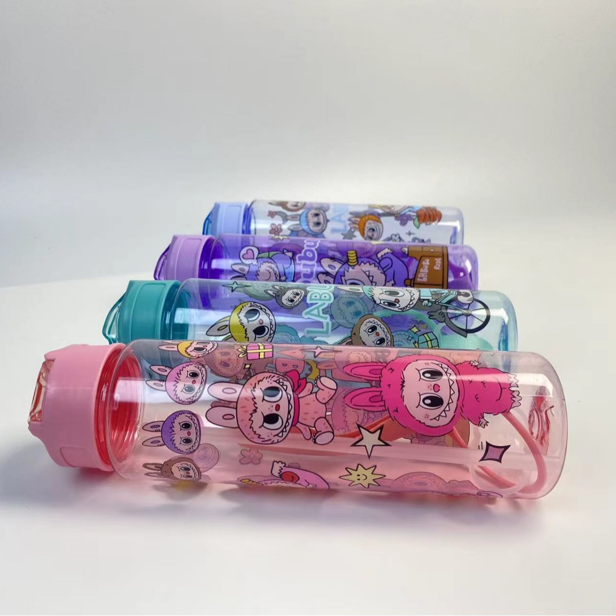 A large-capacity travel water cup with portable cartoon printing, 750ml printed transparent plastic water cup, a bestseller Specification image