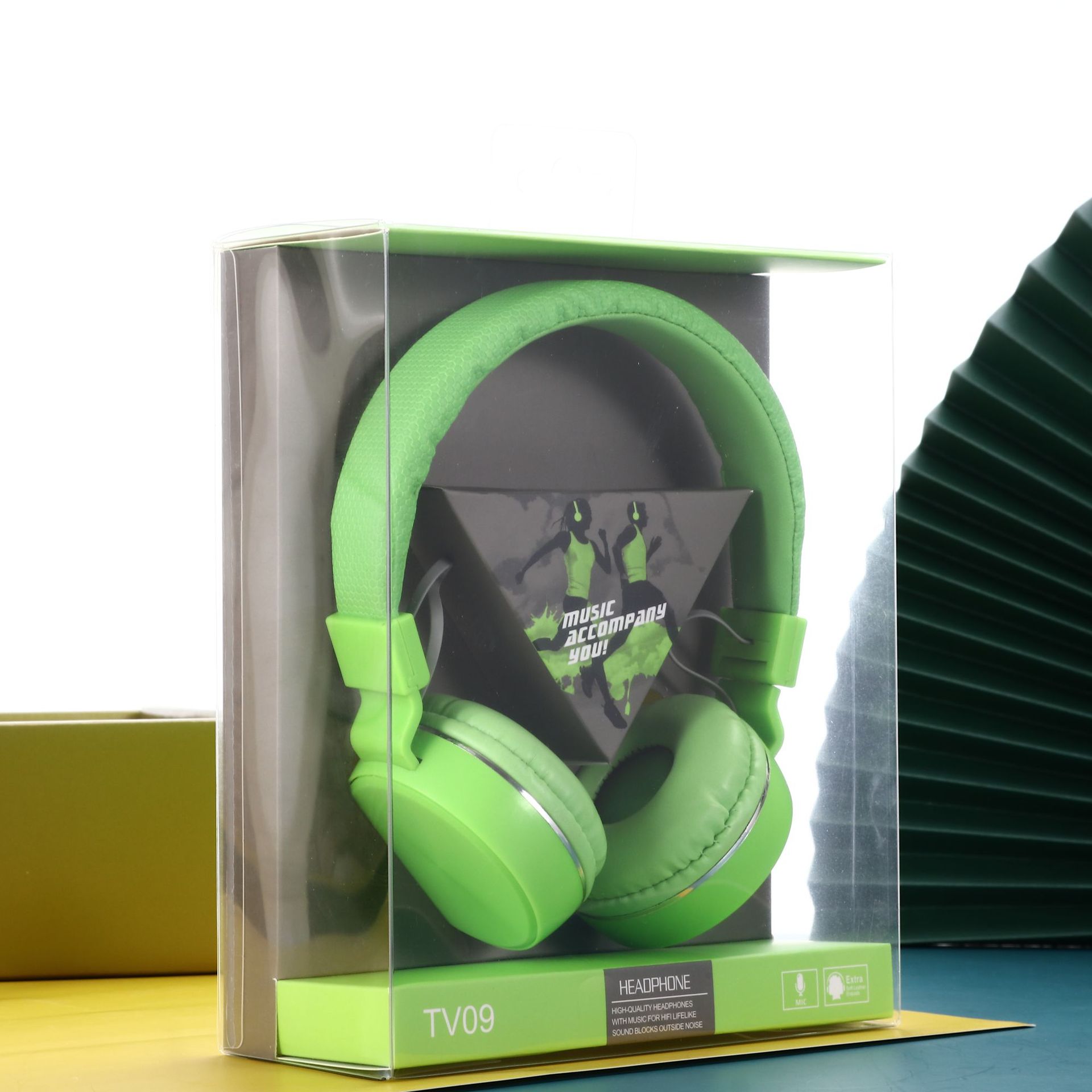 跨境新款TV09马卡龙色有线立体声折叠插卡音乐游戏插线耳机厂家