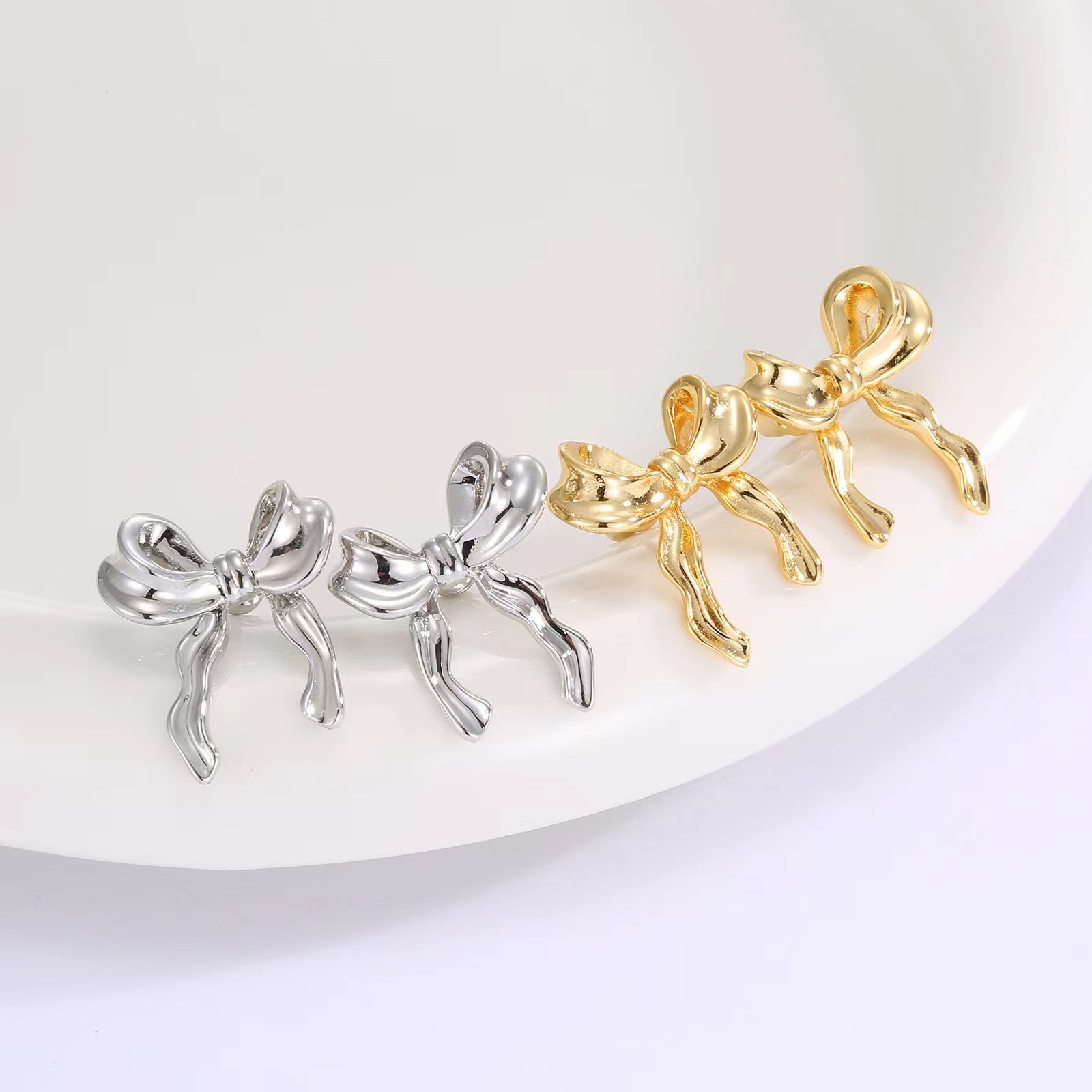Cross-border Amazon bow earrings for women, versatile, exquisite and high-end design, ins style, light luxury and niche details Picture
