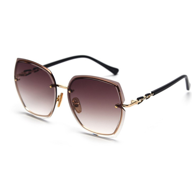 Wholesale of 21 new frameless sunglasses for women's fashion, large-framed trimmed round face UV protection sunglasses Item Picture