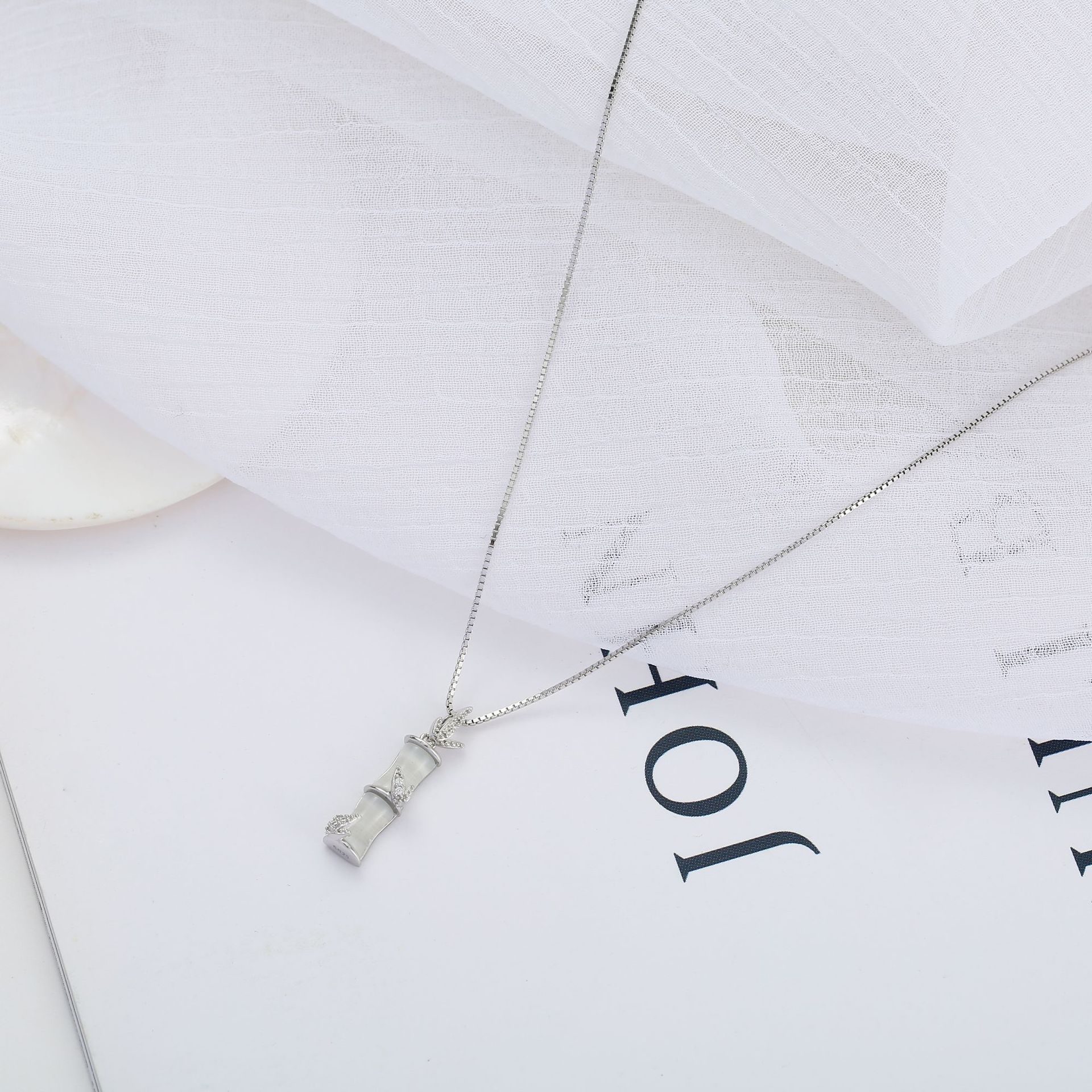 Yaslief Silver chain processing custom designer bamboo newspaper peace pendant cat's eye micro-inlaid decorated necklace details Picture