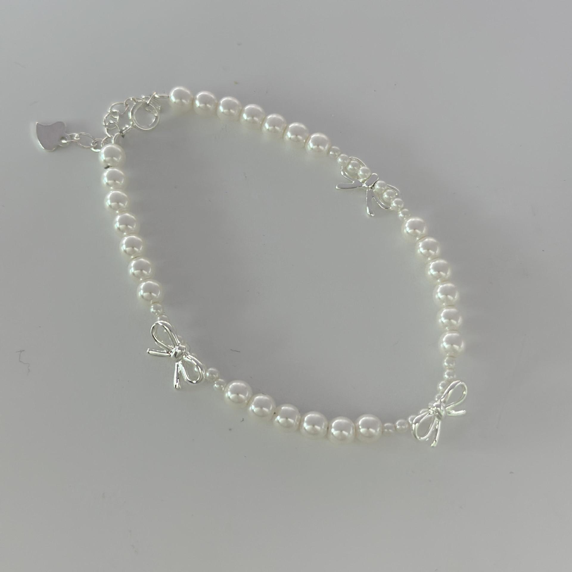 Shi Family Pearl Bow pearl necklace, light luxury, niche design sense, high-end collarbone chain pearl necklace bracelet pic 7