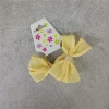 The new spring and summer baby girl hair tie is sweet and cute. It features a bright yellow mini silk gauze bow hair band and hair tie Application Scenario