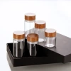 Longchuan 30mm new packaging straight-mouth glass bottle, transparent wood-grain cap small bottle, food-grade empty round bottle Specification image