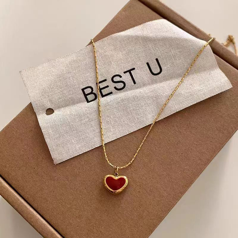 This sweet red heart-shaped necklace from Korean style is elegant, delicate and compact. It is made of titanium steel and plated with 18K gold, making it a versatile collarbone chain for women Item Picture