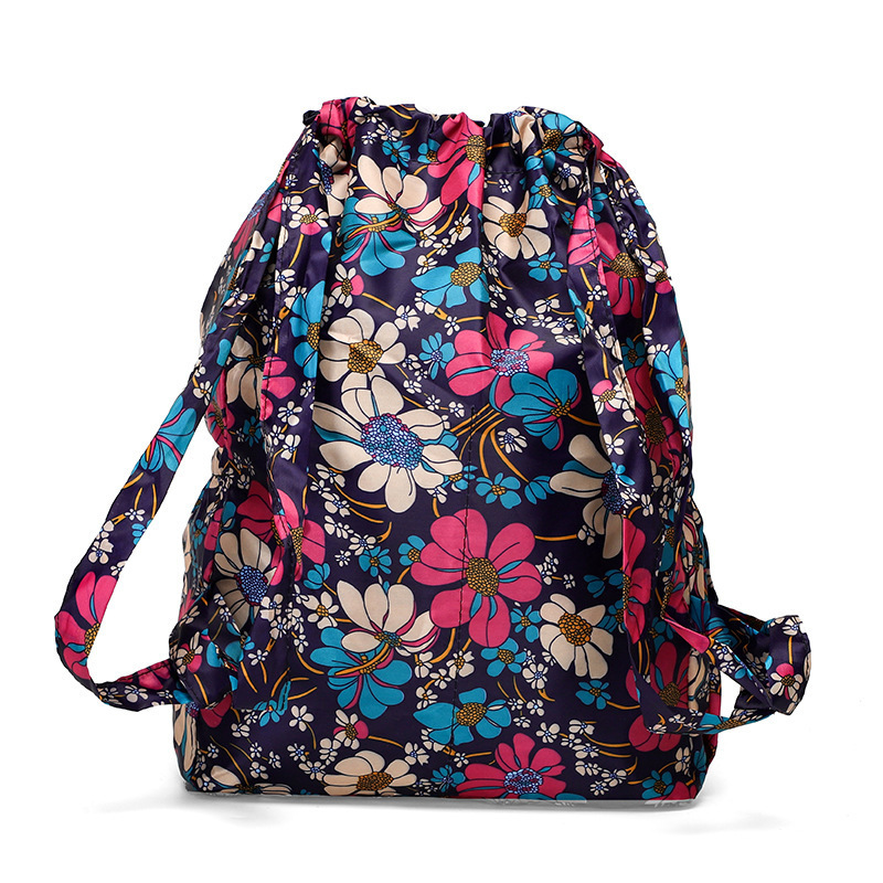 Cross-border floral fabric drawstring bag, drawstring large capacity backpack, women's folding portable shopping bag, outdoor travel backpack Item Picture