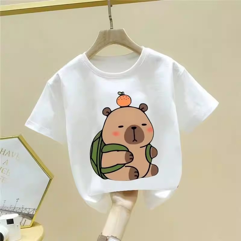 The new spring T-shirt for girls is a versatile choice for both boys and girls. It features a cartoon and stylish short-sleeved top with leather print