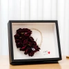 Wholesale of three-dimensional hollow dry flower photo frames, 68-inch and 10-inch A4 and A3 handmade paper rose framing, light picture frame factory details Picture