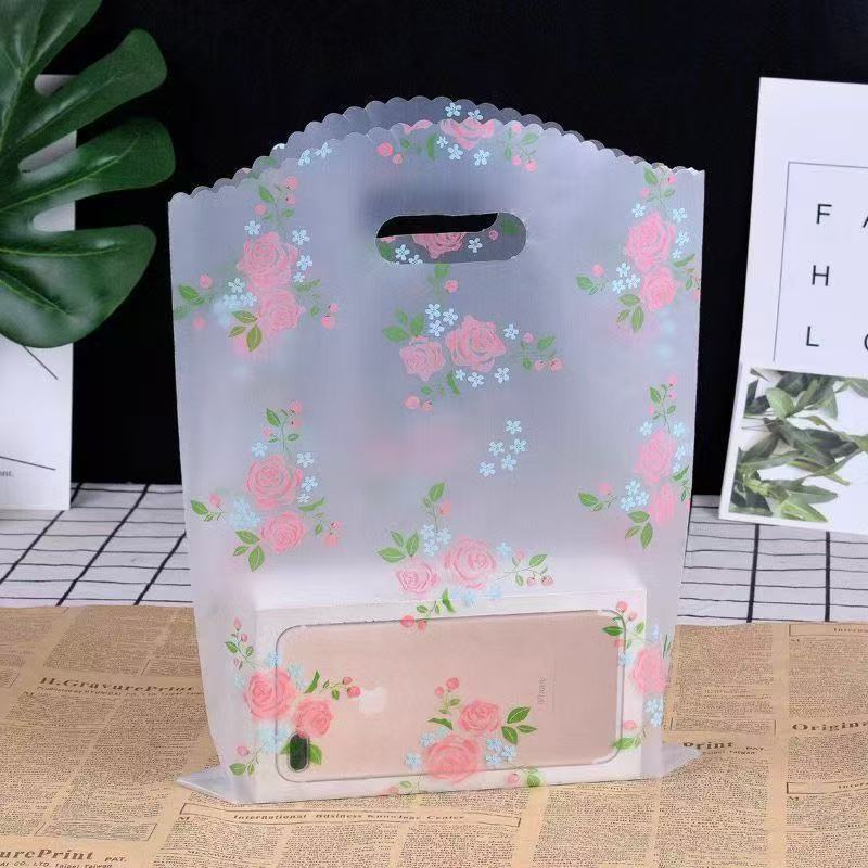 Wholesale flat-mouth plastic bags for mobile phone boxes, handbags, underwear, earrings, shopping bags, cartoon transparent hand-held plastic bags Application Scenario