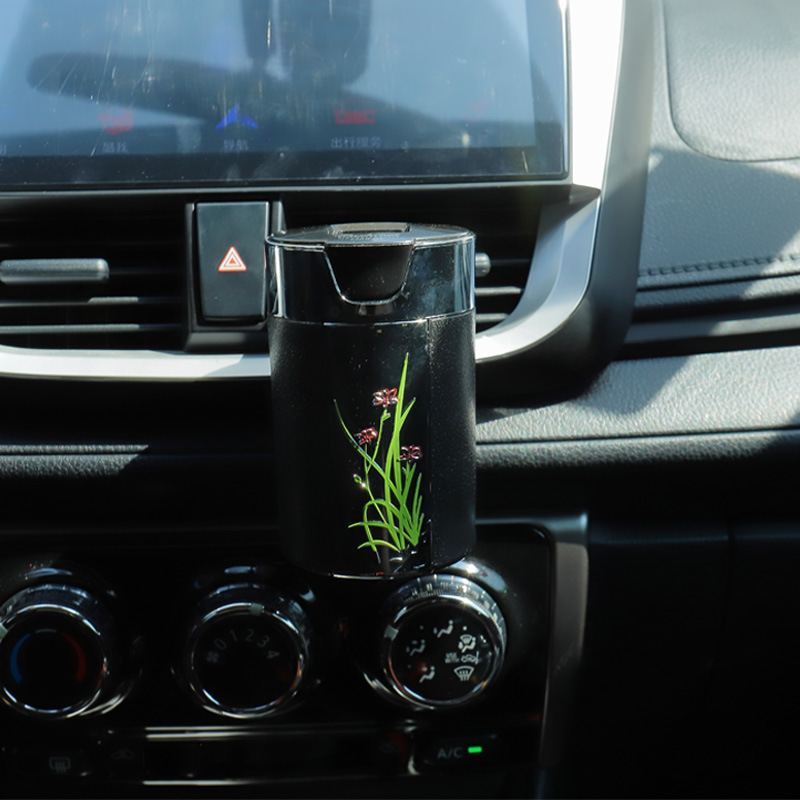 2022新款车载烟灰缸 创意汽车用品带LED灯水仙花图案太阳能烟灰缸详情图3