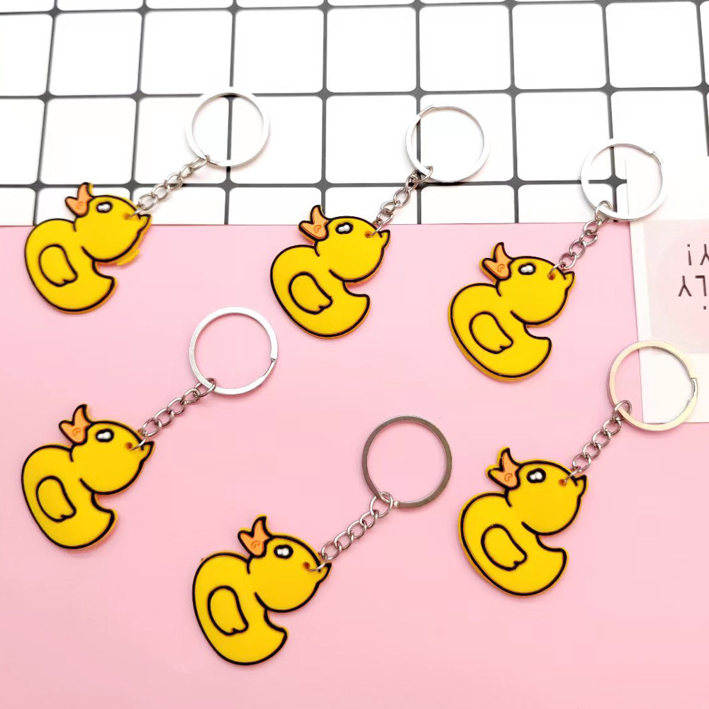 Wholesale cartoon PVC soft rubber little yellow duck keychains, personalized pendants, small gifts and cute accessories details Picture
