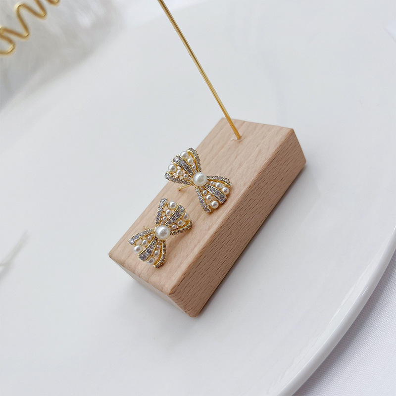 Obi new S925 silver needle pearl bow zircon advanced sense earrings fashion temperament sense female earrings niche Specification drawing