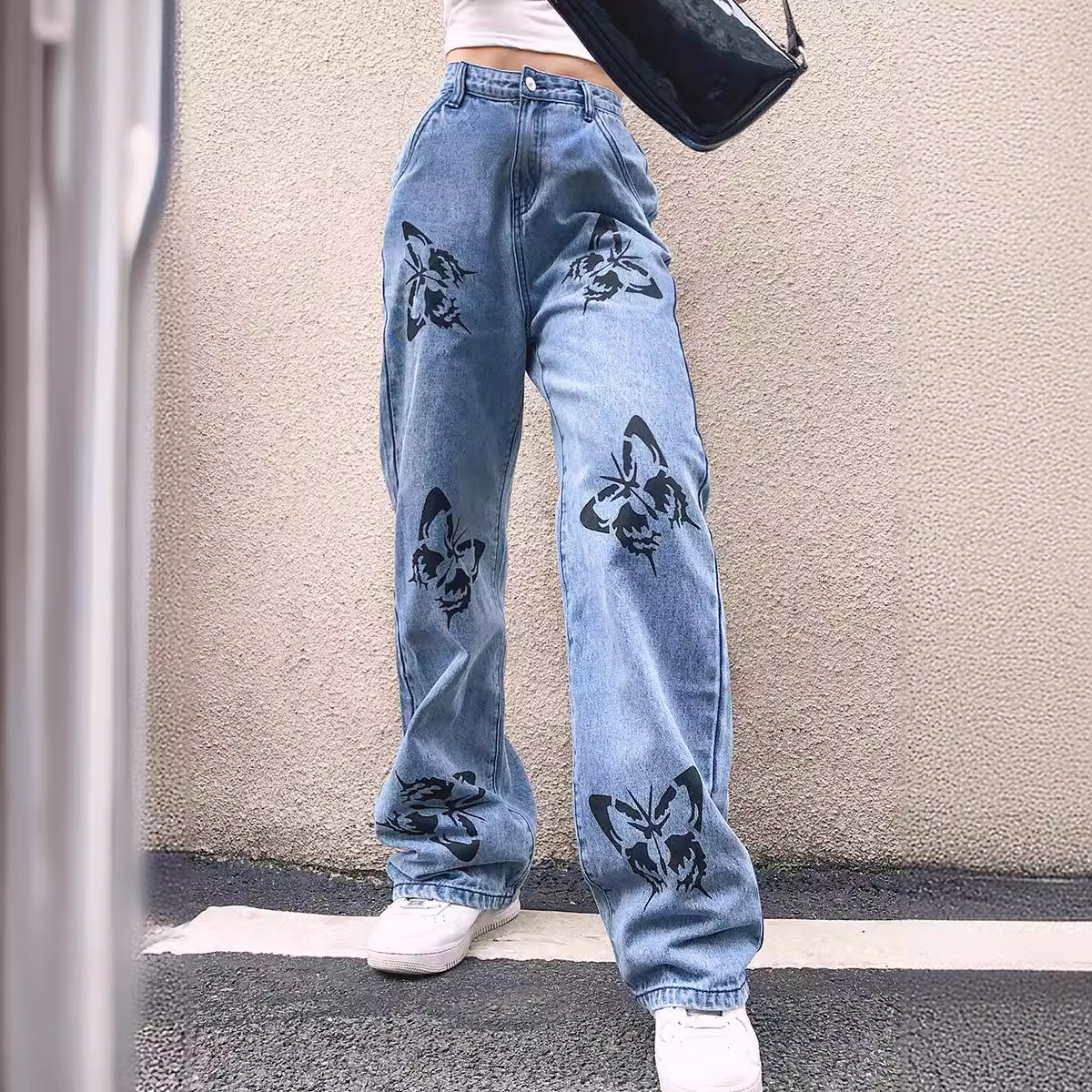 厂家直销欧美跨境货源时尚设计感宽松女印花图案直筒显瘦牛仔长裤