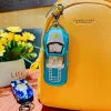 Alloy rebound sports car keychain pendants, graffiti simulation racing car models, student schoolbag pendants, small gifts wholesale Application Scenario