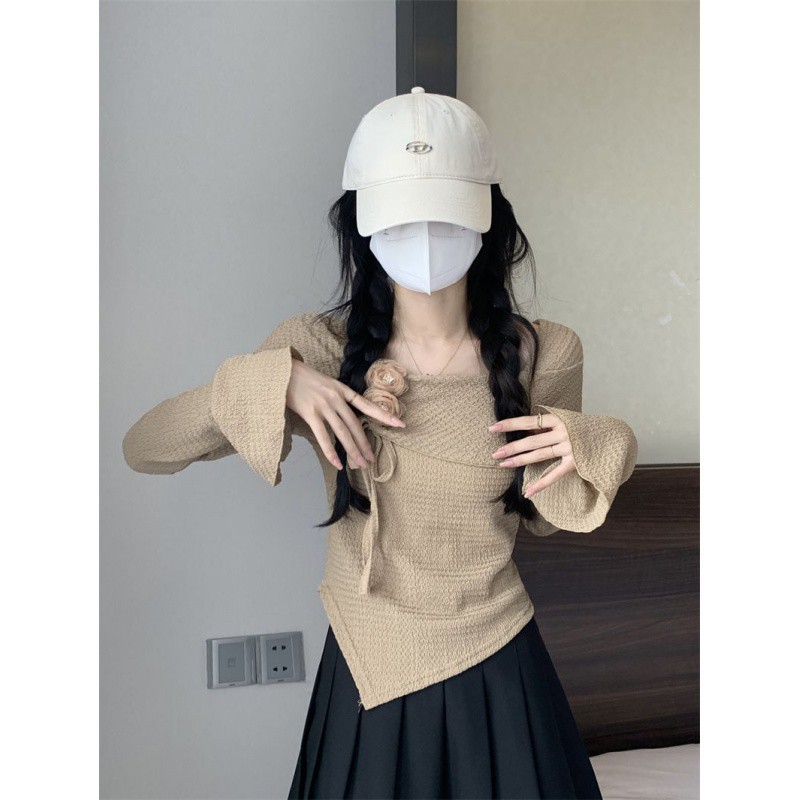 Korean style fashionable and elegant autumn new women's wear, beautiful design sense, slim and irregular long-sleeved short top Application Scenario