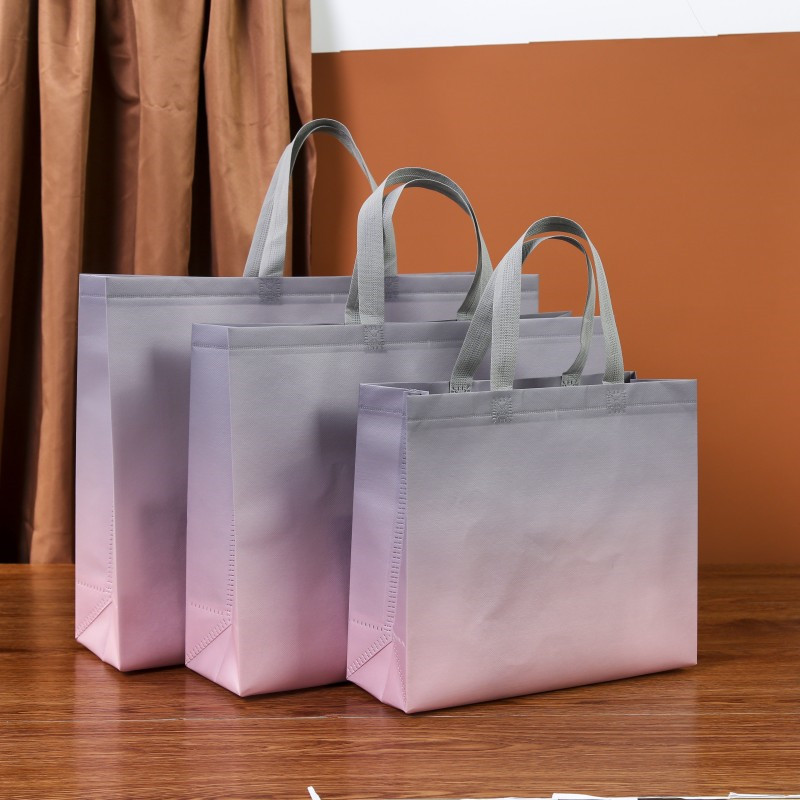 In-stock fashionable gradient non-woven fabric bags, shopping gift bags for shopping malls, gift bags for clothing stores, shopping bags with LOGO printing details Picture
