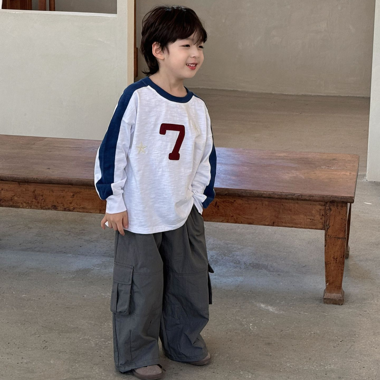 Children's long-sleeved round-neck T-shirts for autumn, featuring embroidery for both boys and girls, are casual and versatile, loose and stylish, with a trendy patchwork top Application Scenario