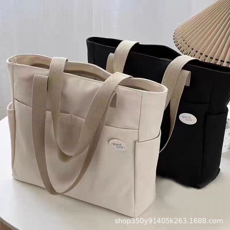 原创设计日系拉链通勤加厚帆布托特包休闲文艺学生简约单肩手提包                              细节图