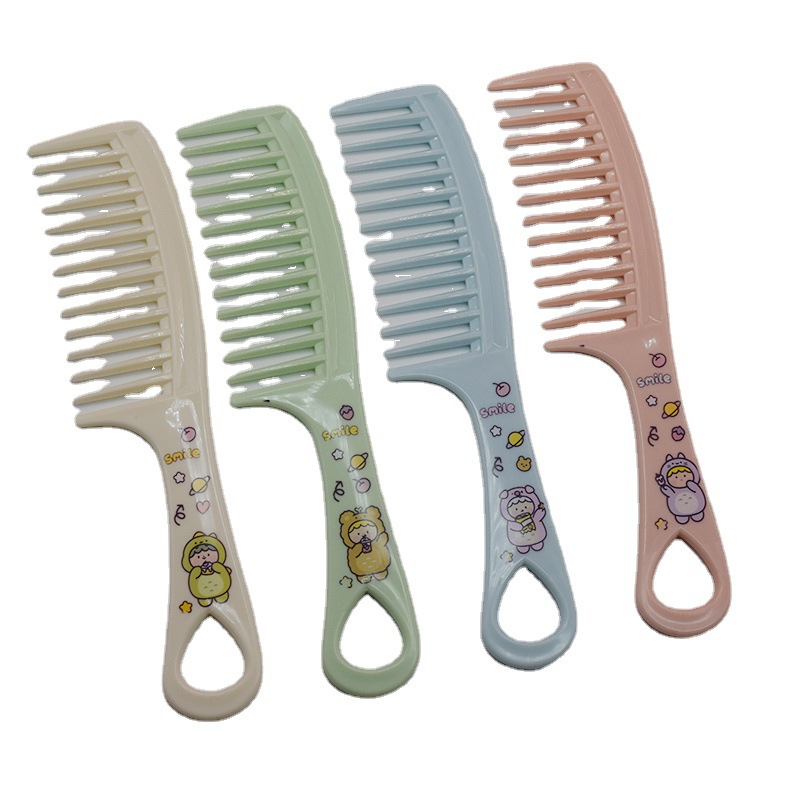 可爱卡通梳子白底实物图