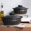 Japanese-style black ten-herb earthenware pot, black clay pot stew pot, household open flame gas soup and rice cooking ceramic earthenware pot details Picture