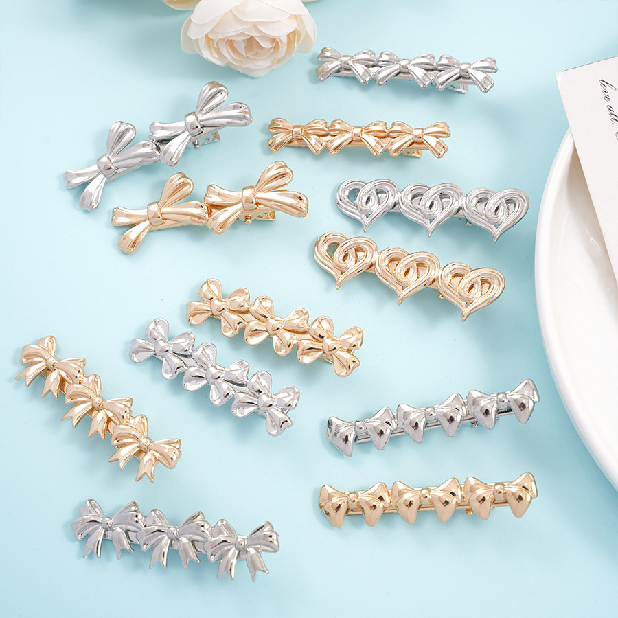 The new bow hair clips of the national trend series feature an InS-style niche design, hollowed-out heart-shaped duckbill clips, side hair clips and bangs clips Application Scenario