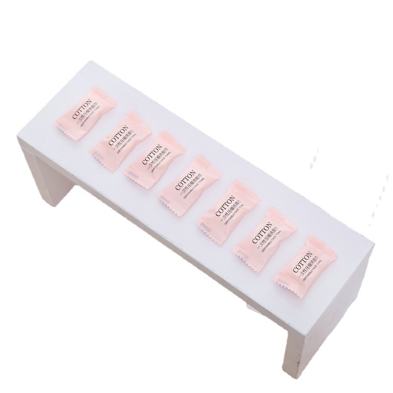 Compressed face towel travel pack Disposable face towel 50 pieces cotton soft towel dry and wet use makeup remover face towel Item Picture