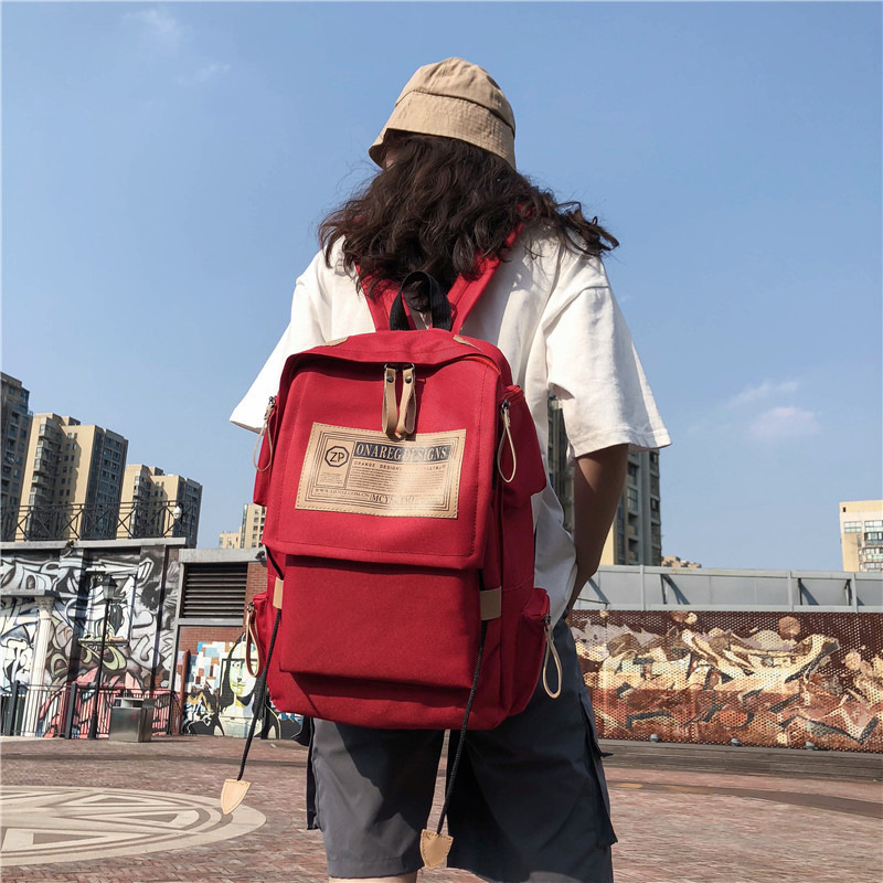 跨境时尚情侣双肩包外贸韩版潮酷男双肩包女批发洋气轻便学生书包细节图