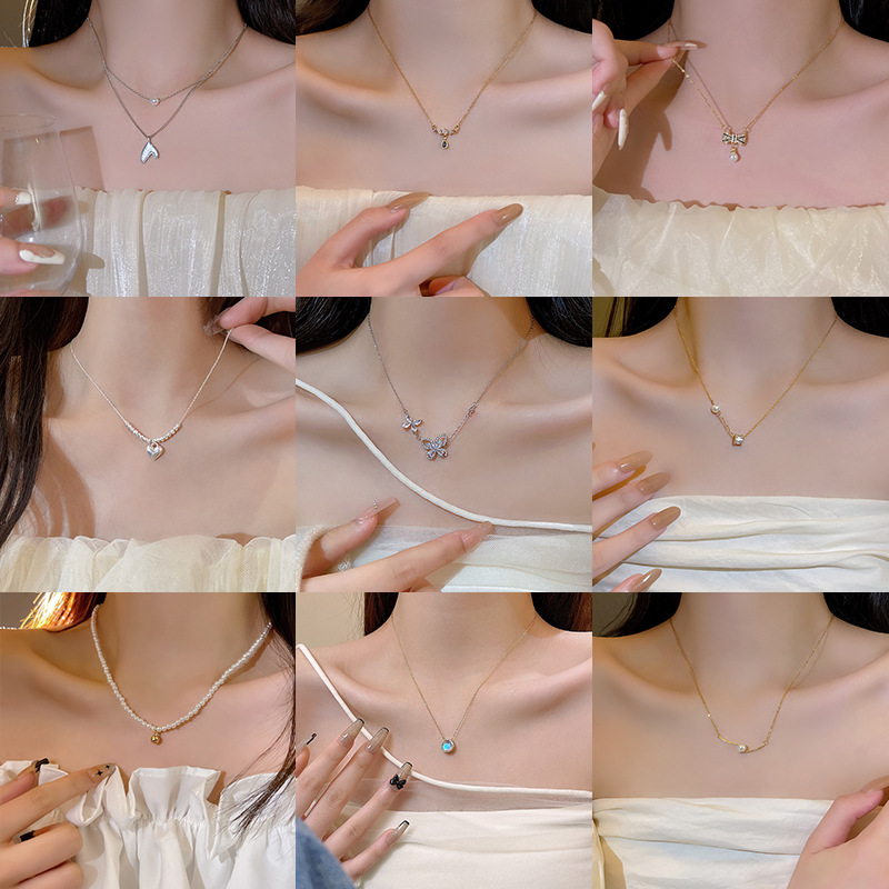South Korea's New Light Luxury Niche Titanium Steel Necklace Female Senior Design Sense Zircon Bow Collarbone Chain Chain Wholesale details Picture