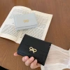 Ladies' wallet ins Women's bow, simple Korean version, short, high-end, small folding Wallet, cross-border wholesale Specification image