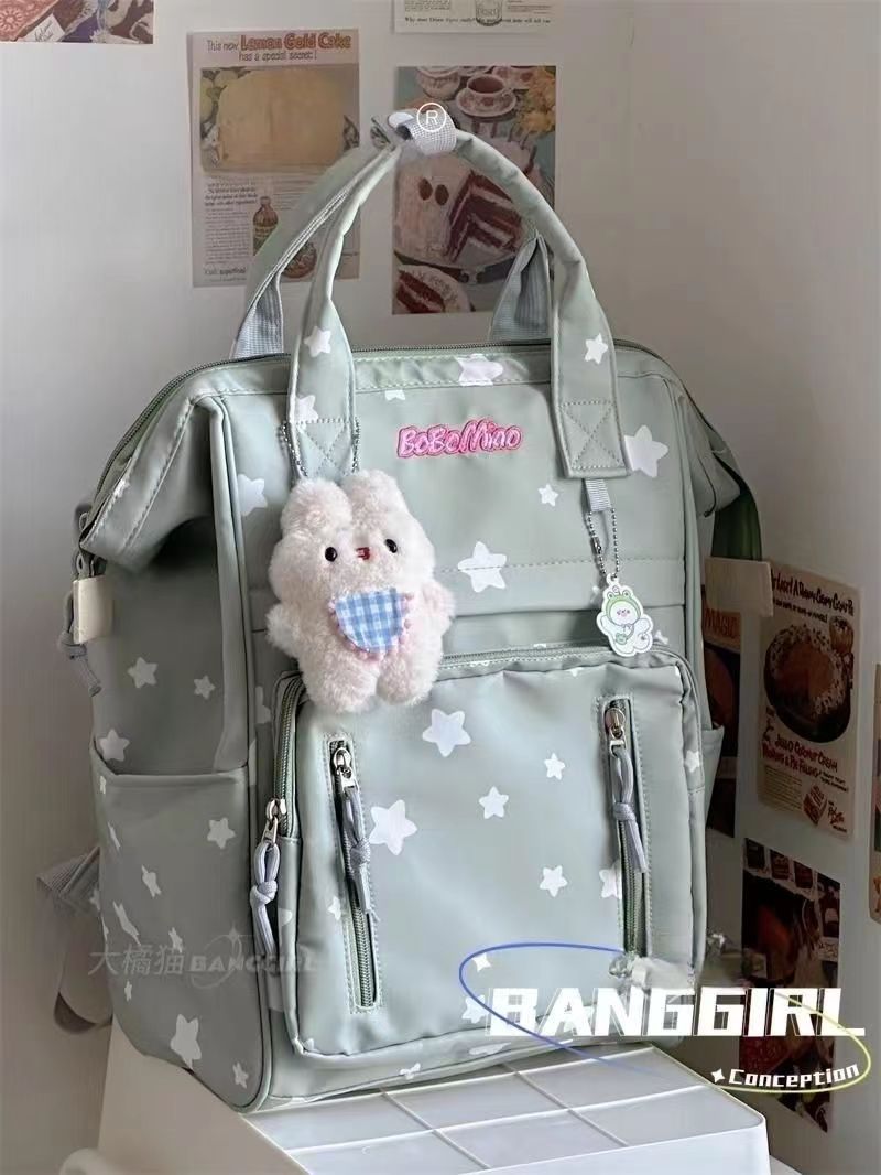 A Japanese-style inS-style schoolbag for a junior high school girl with a high level of appearance, a simple backpack for a trip, and a Korean-style hand-held backpack Application Scenario