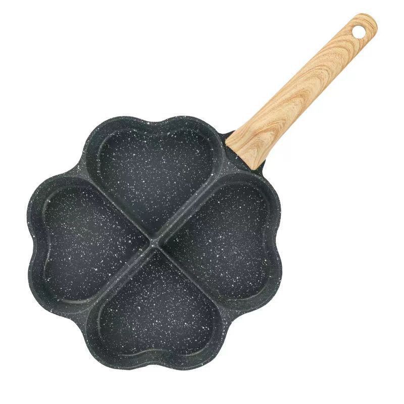 A home-use tourmaline heart-shaped four-hole egg-frying breakfast pan Item Picture