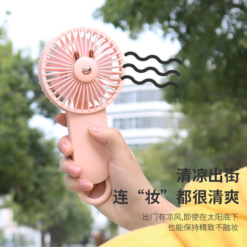 Drip fan, fresh cartoon phone stand, USB charging, portable handheld small fan with light, advertising gift details Picture