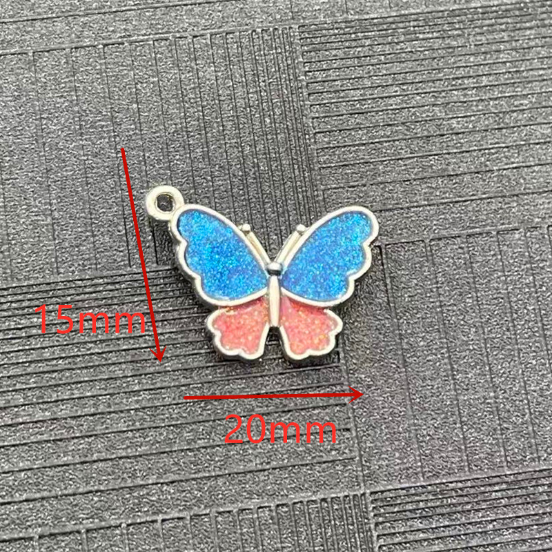 Factory direct sales of pink and blue flowing sand butterfly pendant, super sweet and ethereal necklace, Korean version of best friend spring and summer accessories, personalized and trendy